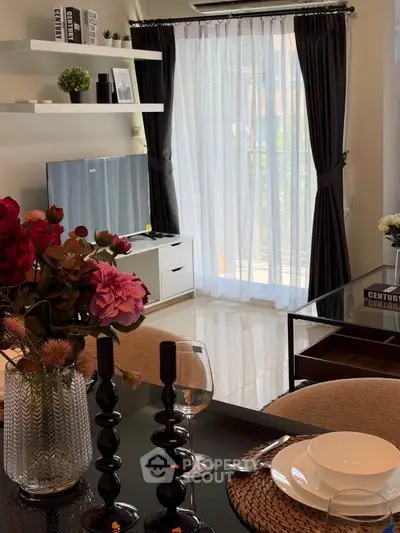 Elegant living room with modern decor, large window, and stylish dining setup, perfect for urban living.