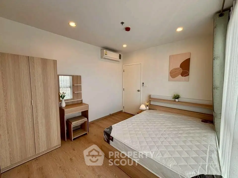 Modern bedroom with wooden furniture and natural light