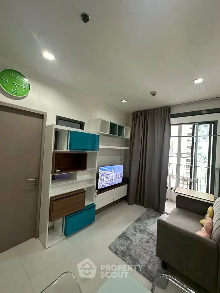 Modern living room with stylish shelving and large window view