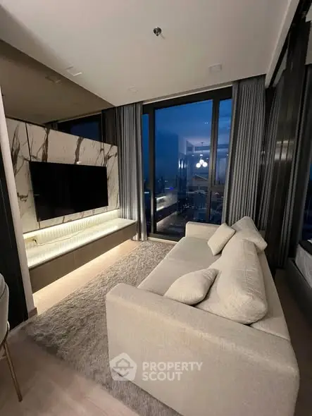 Luxurious modern living room with large windows and elegant decor