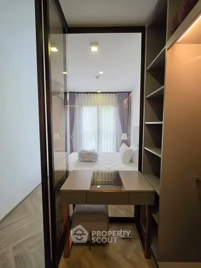Modern bedroom with stylish walk-in closet and natural light