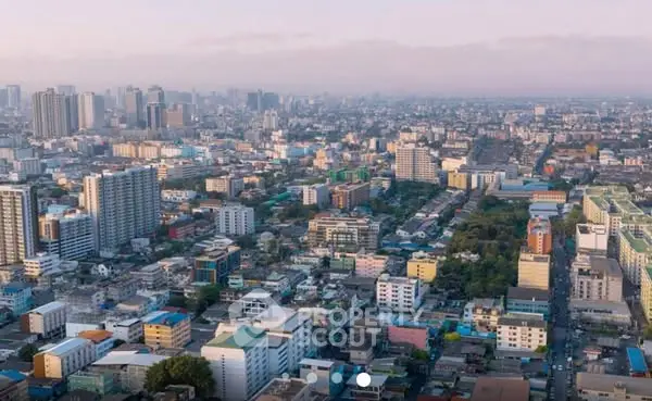 Stunning aerial view of a bustling cityscape with diverse architecture and skyline.