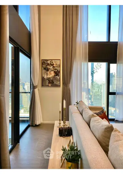 Luxurious high-rise living room with stunning city view and elegant decor