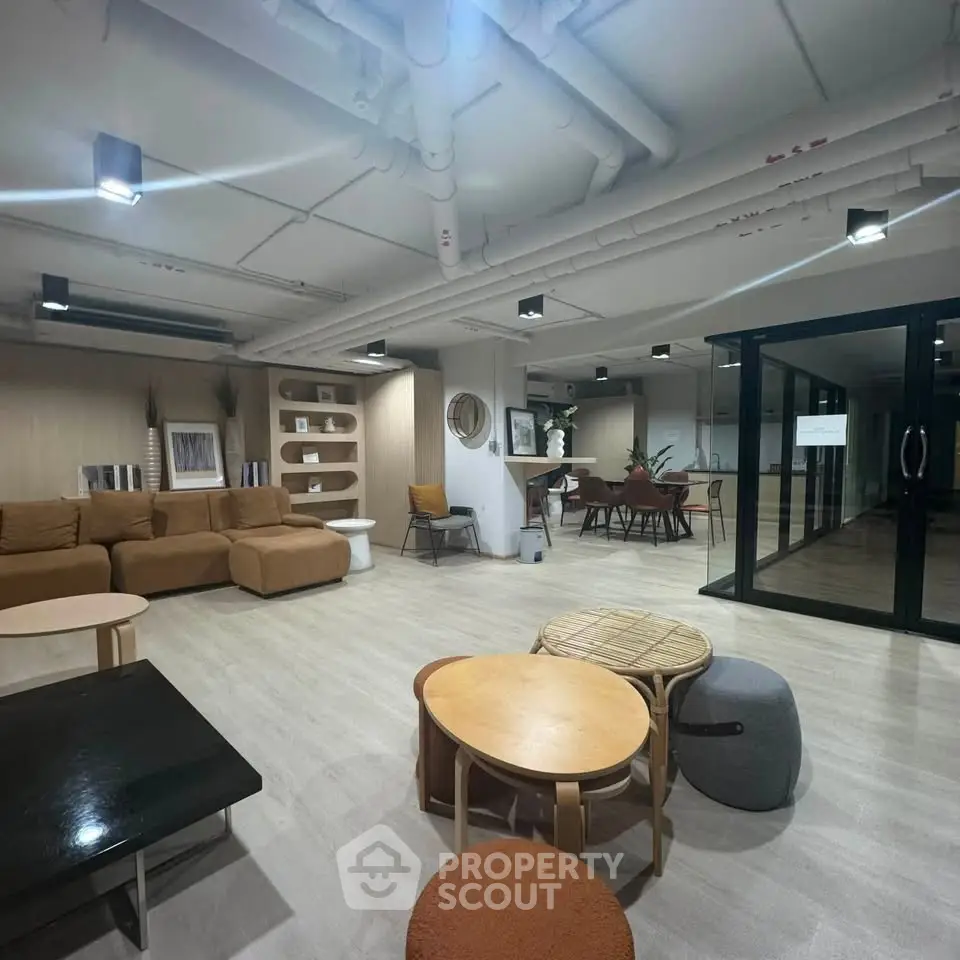 Modern co-working space with stylish furniture and open layout