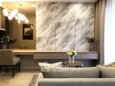 Elegant living room with modern decor and stylish lighting, featuring a cozy sofa and decorative plants.