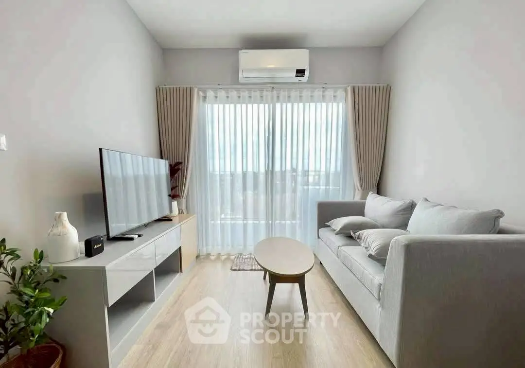 Modern living room with sleek furniture and natural light