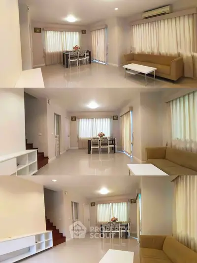 Spacious living room with modern decor and natural light