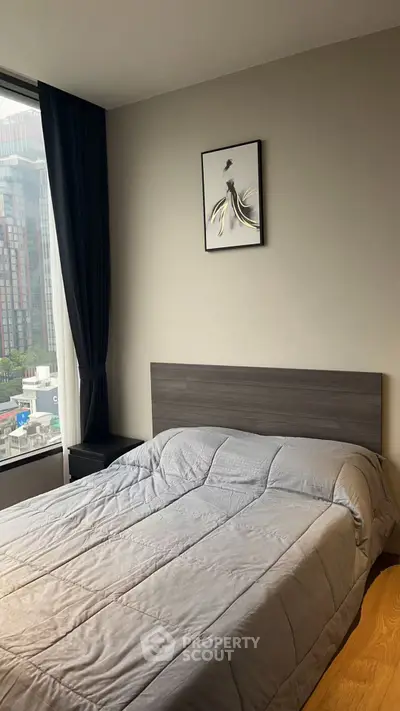 Modern bedroom with city view and stylish decor