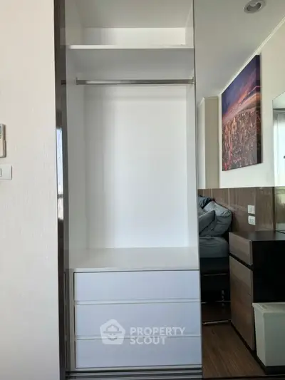 Modern bedroom with built-in closet and stylish decor