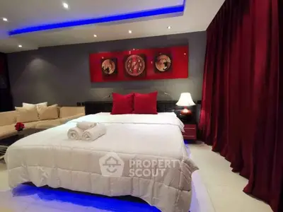 Luxurious bedroom with modern decor and ambient lighting