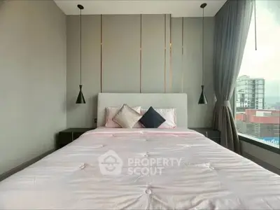 Modern bedroom with large window and stylish decor in urban apartment