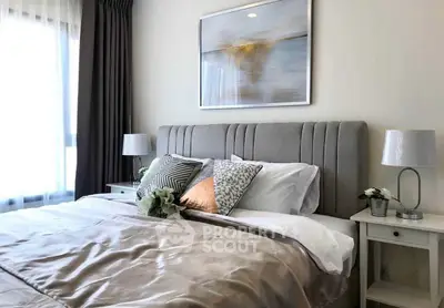 Luxurious bedroom with elegant decor and plush bedding in modern apartment