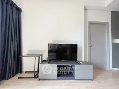 Modern living room with sleek TV stand and minimalist decor
