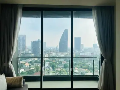 Stunning cityscape view from modern apartment living room with large windows and elegant curtains.