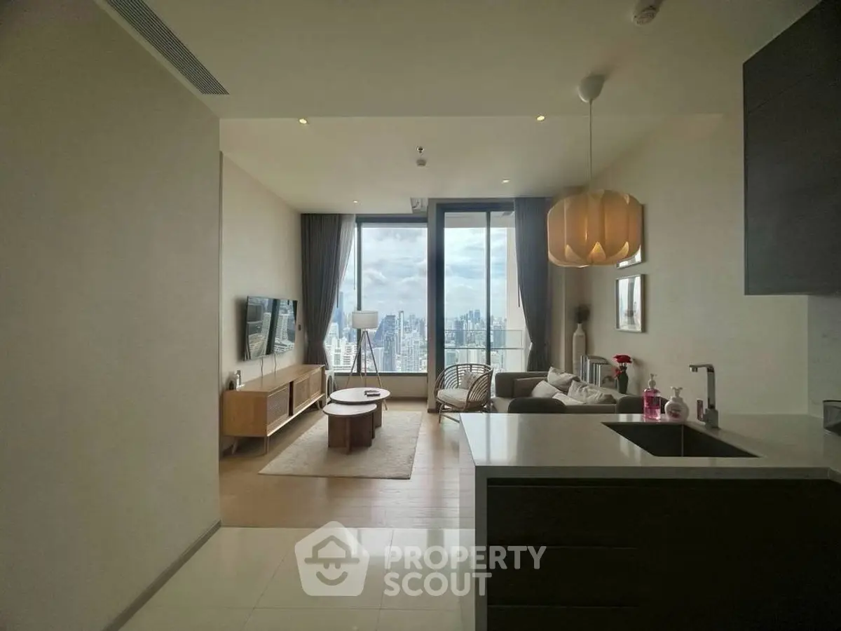 Modern living room with stunning city view and elegant decor