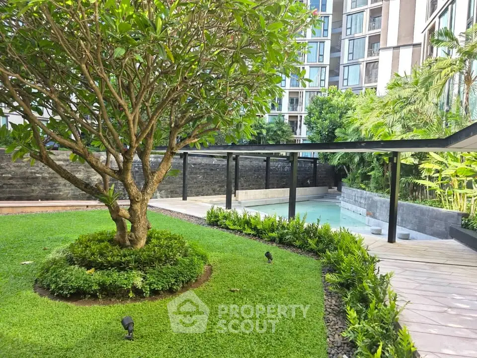 Luxurious garden view with pool in modern residential complex
