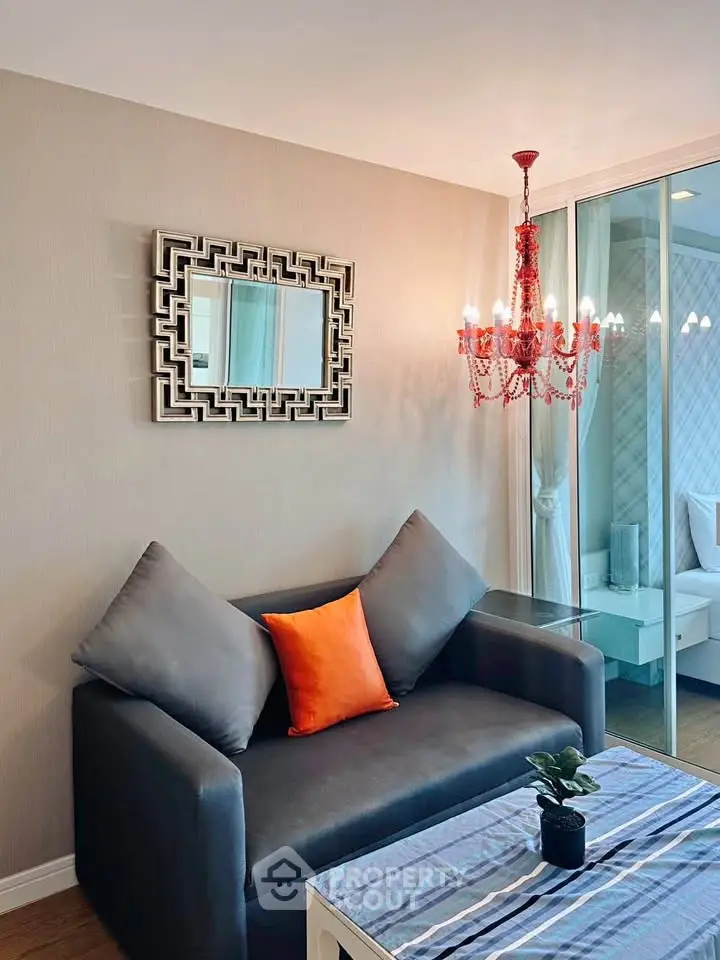 Stylish living room with modern decor and elegant chandelier