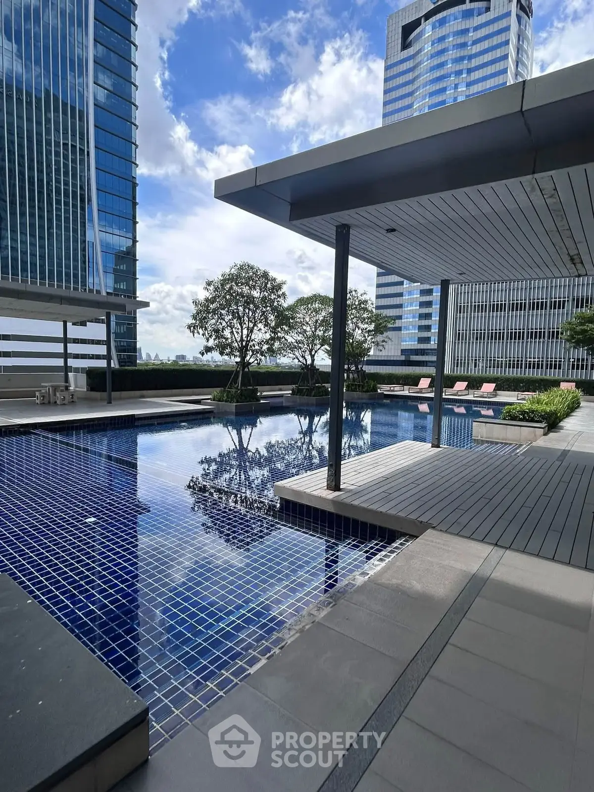 Luxurious rooftop pool with stunning city views and modern architecture.