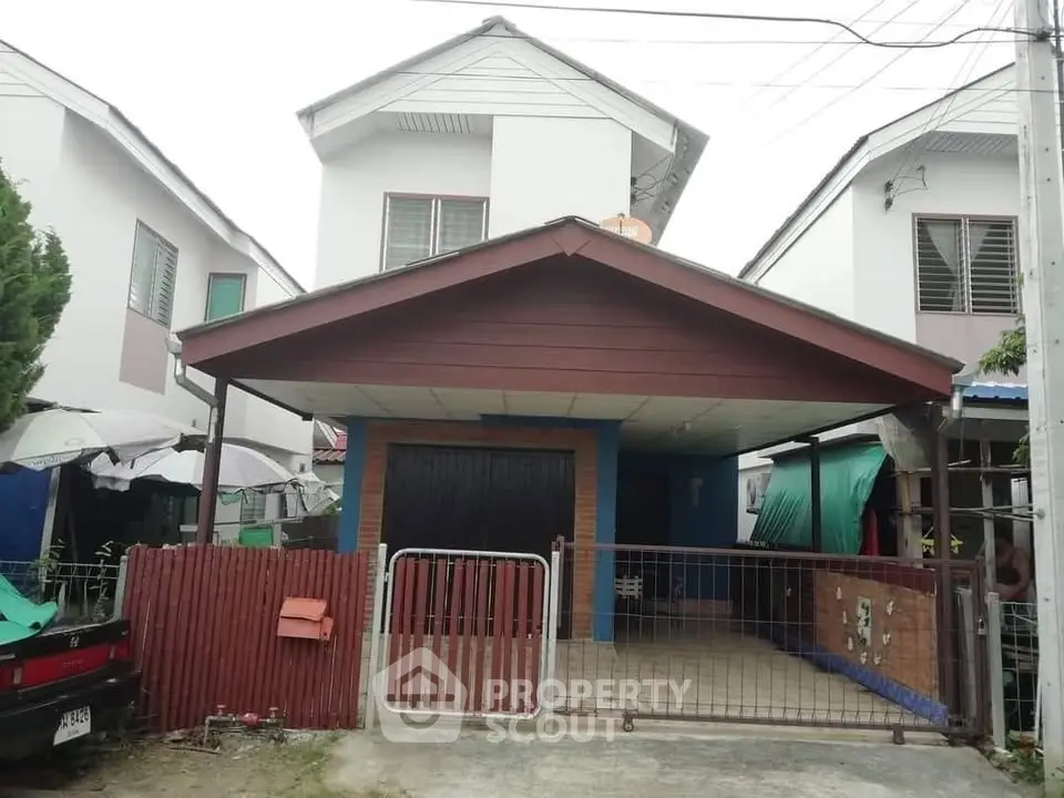 Charming suburban house with carport and fenced yard, perfect for family living.