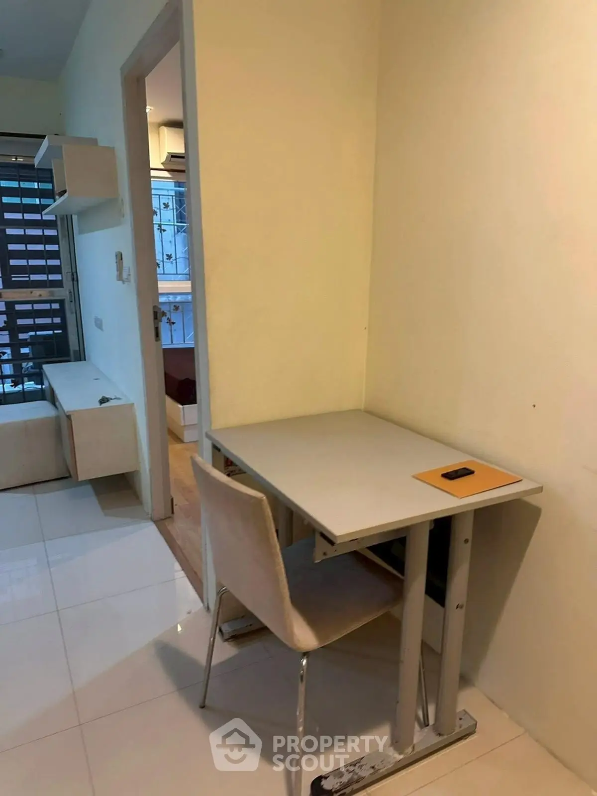 Cozy study nook in modern apartment with sleek furniture and natural light