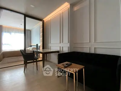 Modern living room with elegant decor and cozy seating area