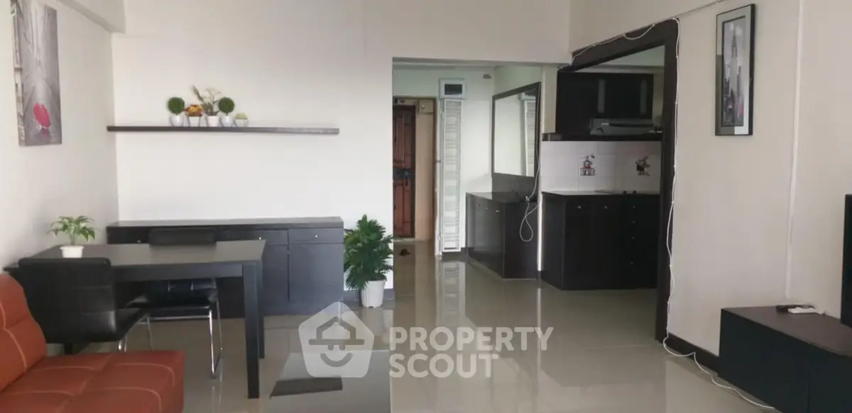 Modern living room with sleek furniture and open layout