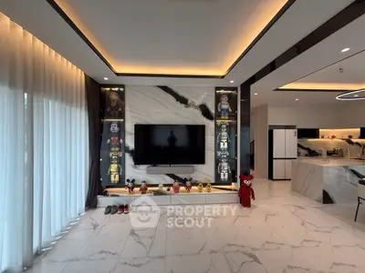 Luxurious modern living room with marble flooring and stylish decor