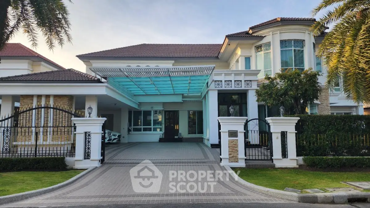 Luxurious modern villa with grand entrance and spacious driveway