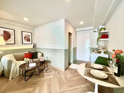 Chic modern living room with stylish decor and dining area in open layout apartment.