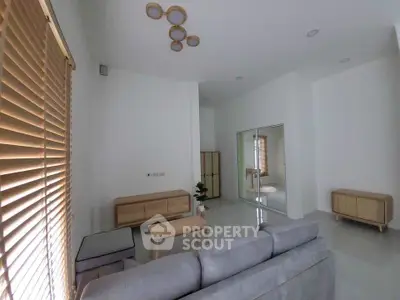 Modern living room with sleek furniture and natural light