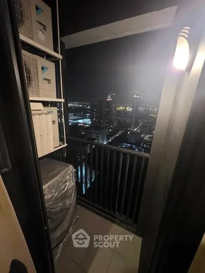 Stunning night cityscape view from a high-rise balcony, perfect for urban living.