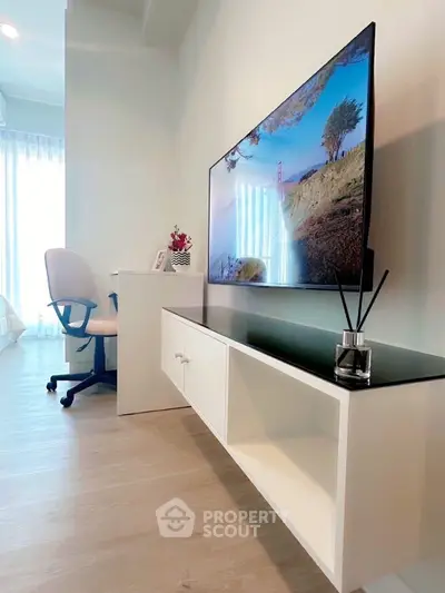 Modern living room with sleek TV setup and stylish decor