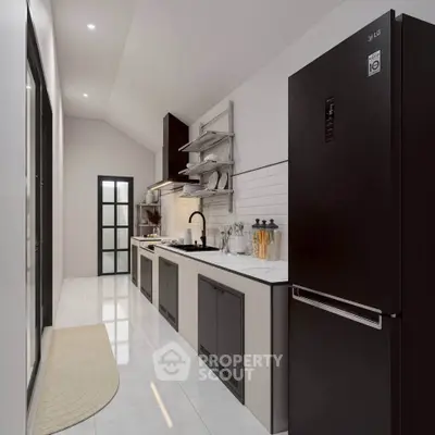 Modern kitchen with sleek black appliances and minimalist design in a narrow layout.