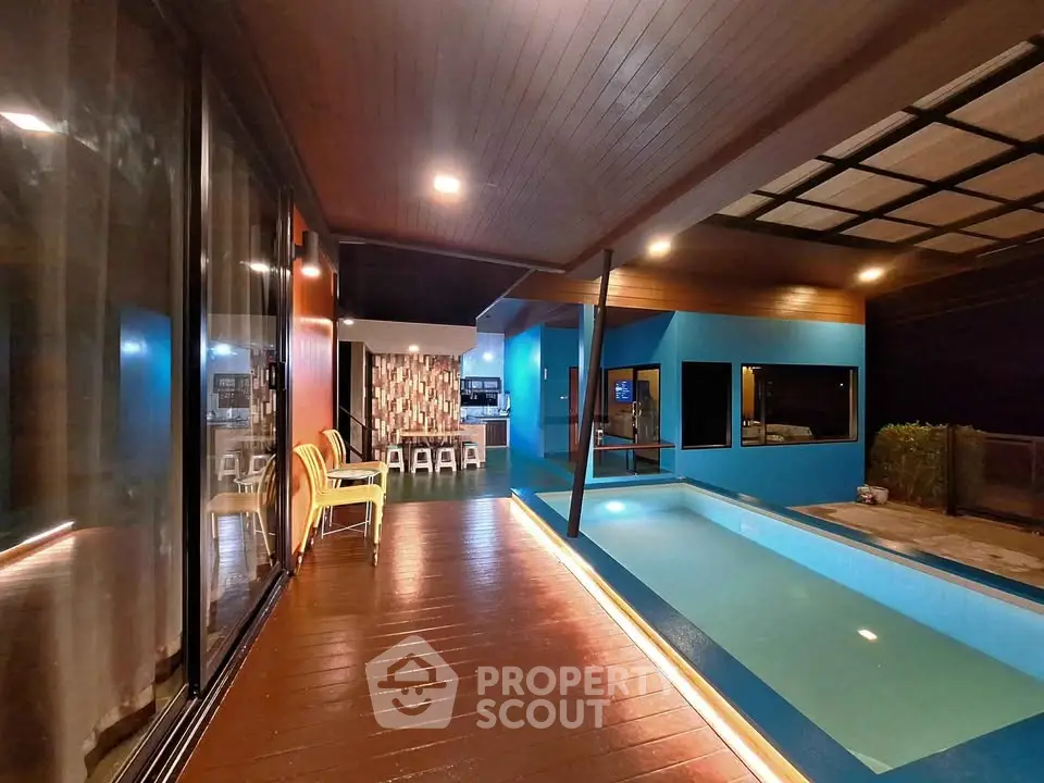 Luxurious modern home with indoor pool and stylish open layout, perfect for relaxation and entertainment.