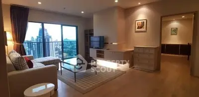 Spacious modern living room with city view and elegant decor