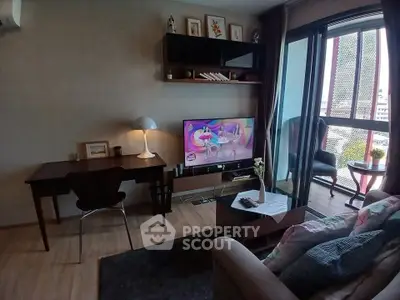 Cozy living room with modern decor and balcony view in urban apartment