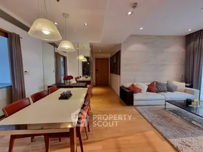 Elegant living and dining area with modern decor and cozy ambiance