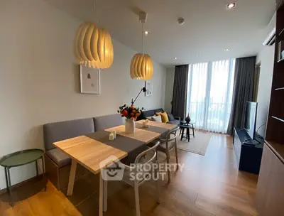 Modern living room with stylish lighting and cozy seating area