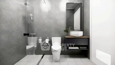 Modern bathroom with sleek design and glass shower enclosure