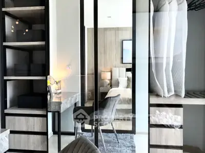 Modern bedroom with stylish walk-in closet and elegant decor