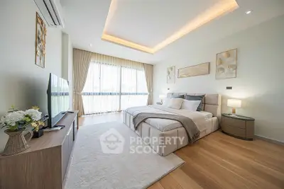 Luxurious modern bedroom with elegant decor and natural light