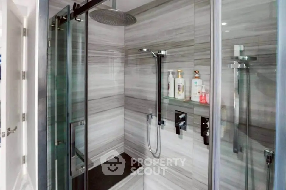 Luxurious modern bathroom with sleek shower and elegant fixtures