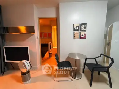 Modern living room with stylish furniture and contemporary decor in a cozy apartment setting.