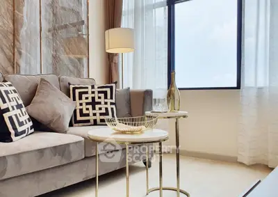 Luxurious modern living room with elegant decor and large window view