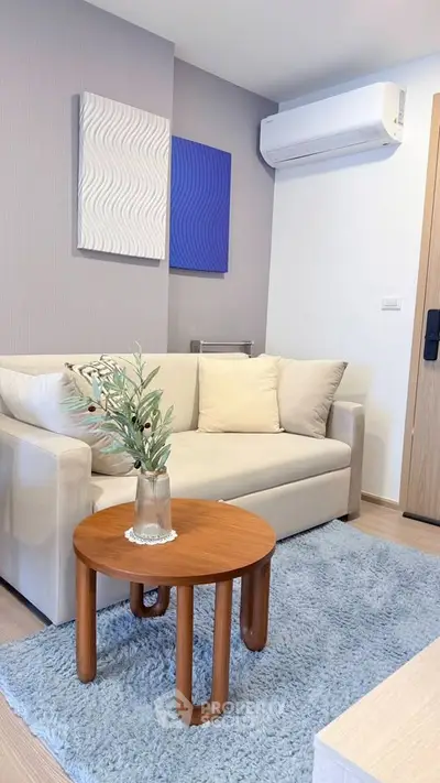 Modern living room with cozy sofa and stylish decor