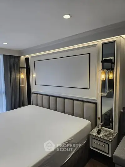 Luxurious bedroom with elegant lighting and modern decor