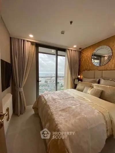 Luxurious bedroom with stunning city view and elegant decor