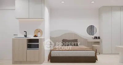 Modern bedroom with integrated kitchenette and stylish decor