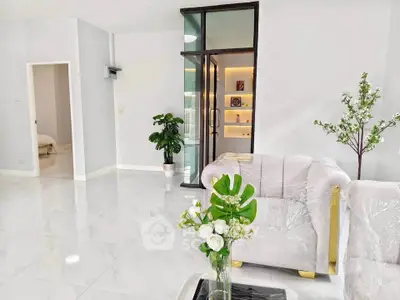 Spacious modern living room with elegant decor and natural light