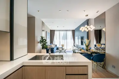 Modern open-plan living room with elegant dining area and stylish decor